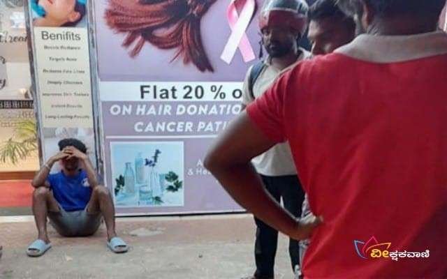 ಕಟ್ಟಡಕ್ಕೆ ಕಲ್ಲೆಸೆದ ಯುವಕ.